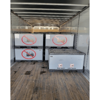 A room with boxes in it

Description automatically generated with medium confidence